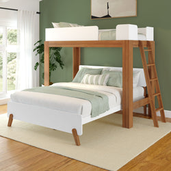 Modern wooden loft bed with ladder and stylish bedding in a green-walled bedroom.