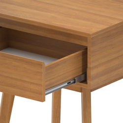 Wooden desk with open drawer showcasing sleek design and modern functionality.