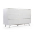 Mid-century modern white wooden dresser with six drawers.