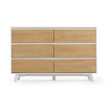 Modern wooden six-drawer dresser with a white frame, ideal for stylish bedroom storage solutions.