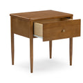 Mid-century modern wood nightstand side table with one open drawer, tapered legs and round brass knob in warm walnut finish