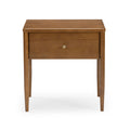Mid-century modern wooden nightstand bedside table with single drawer and round brass knob, warm brown finish and tapered legs on white background