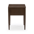 Dark brown wooden side table with square top and tapered legs on white background