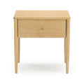 Minimalist light wood bedside table nightstand with single drawer, round knob, tapered legs and natural wood finish