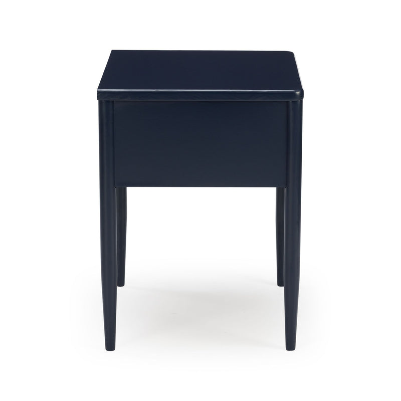 Navy blue square-top stool with padded seat and tapered legs on white background — modern accent side table for bedroom or living room