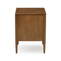 Mid-century modern solid wood bedside table in warm brown finish with smooth top and tapered legs