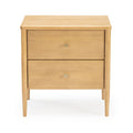 Mid-century modern light wood two-drawer nightstand with brass knobs and tapered legs, natural maple finish bedside table