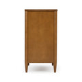 Mid-century modern wooden nightstand rear view, warm honey wood finish, tapered legs and minimalist panel design on white background