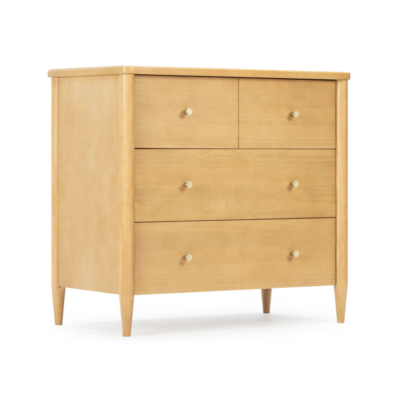 Light maple mid-century modern four-drawer dresser with round brass knobs, tapered legs and natural wood finish for bedroom storage