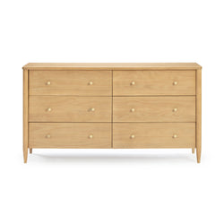 Natural maple six-drawer dresser with round brass knobs and tapered legs on white background — mid-century modern wooden bedroom storage chest