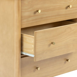 Light pine dresser with open drawers, brass cone knobs and dovetail joints — natural wood bedroom storage cabinet