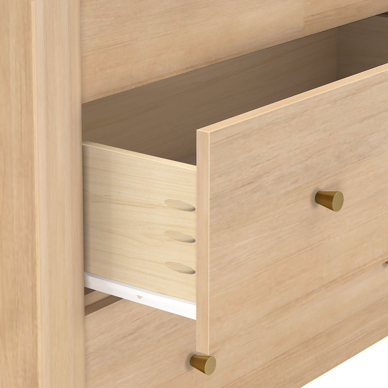 Light wood dresser drawer open showing dovetail joints, brass knobs, white drawer slide and maple finish — modern minimalist wooden furniture close-up