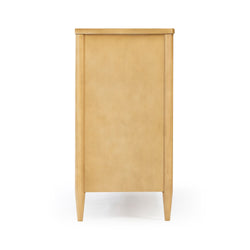 Front view of light maple mid-century modern narrow wooden dresser cabinet with smooth panel front and tapered legs on white background