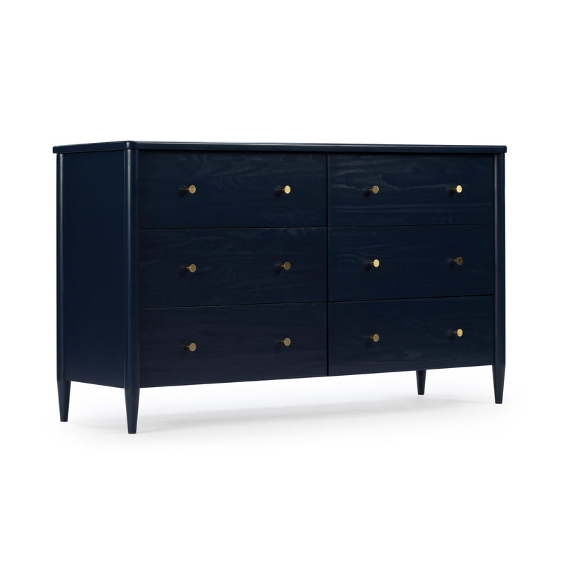 Navy blue mid-century modern wooden dresser with six drawers, round brass knobs, tapered legs and visible wood grain for bedroom storage