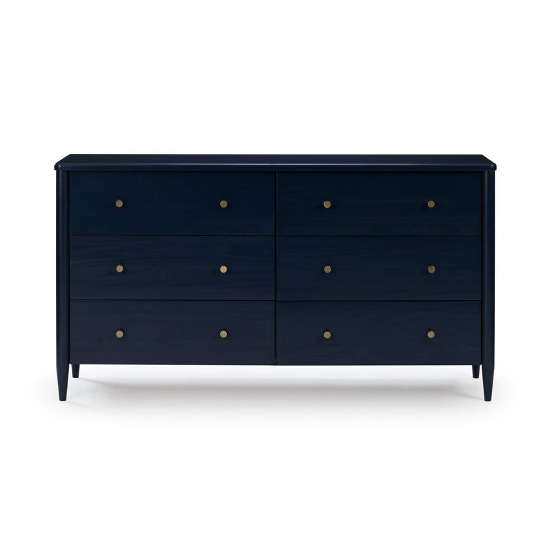 Navy blue six-drawer mid-century modern wood dresser with brass knobs on tapered legs, bedroom storage chest on white background