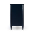 Modern navy blue bedside cabinet with tapered legs and smooth finish — minimalist nightstand for bedroom storage