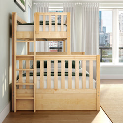 Solid wood twin-over-twin bunk bed with ladder and natural pine finish in bright modern kids' bedroom, green bedding, sheer curtains and city skyline window view