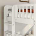 Close-up of white wooden bunk bed ladder and slatted guardrail with rust orange blanket in a modern nursery toddler loft bed safety rails