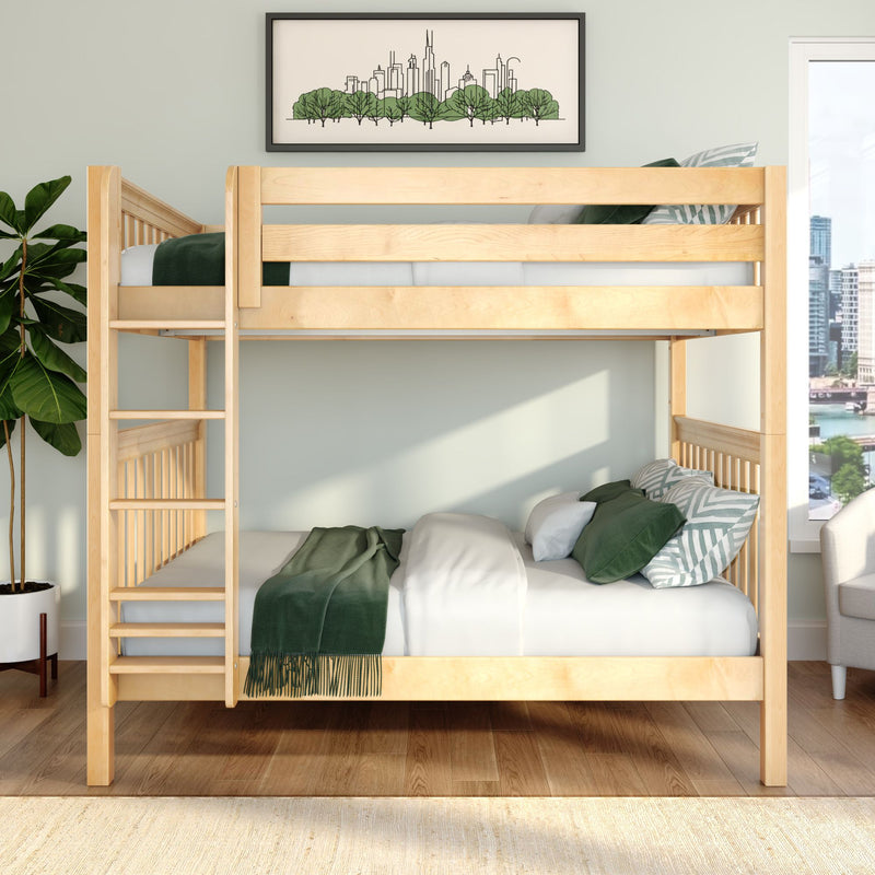 Natural solid wood bunk bed with green bedding in a sunlit modern kids' bedroom with plant and city skyline art