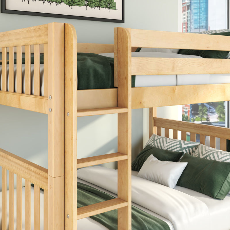 Solid maple wood twin-over-full bunk bed with built-in ladder, green linens and patterned pillows in a modern kids' bedroom with city-view window