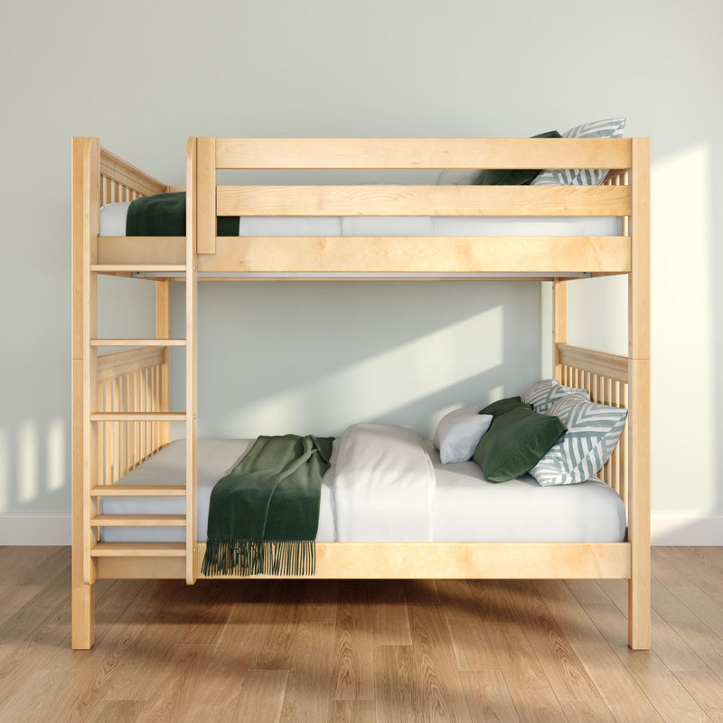 Natural wood bunk bed with green bedding in a bright minimalist children's bedroom