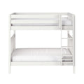 White wooden bunk bed with ladder and safety rails, modern minimalist kids loft bed with white mattress and bedding