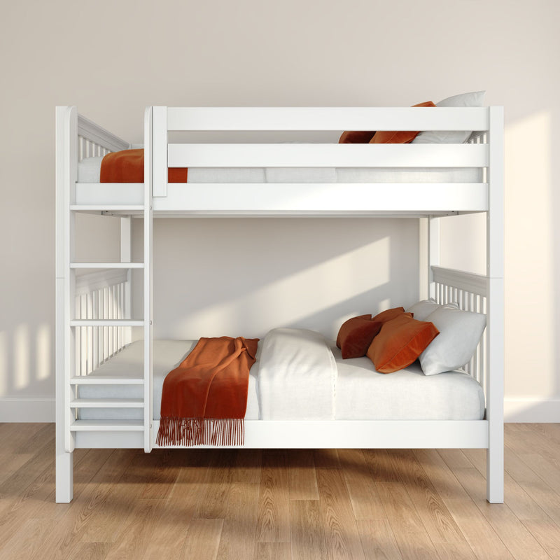 White wooden bunk bed with orange throws and pillows in a modern minimalist kids' bedroom, space-saving loft bed with ladder and natural light