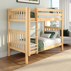 Light natural wood twin-over-twin bunk bed with built-in ladder and safety rails, green and white bedding in a modern kids' bedroom with hardwood floors and large window