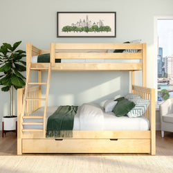 Light wood bunk bed in a modern kids' bedroom with green bedding, ladder and under-bed drawers, potted plant and framed city skyline art