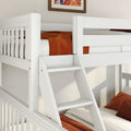 White wooden twin bunk bed with ladder and rust-orange bedding in a modern kids' bedroom, close-up of guardrails and mattress