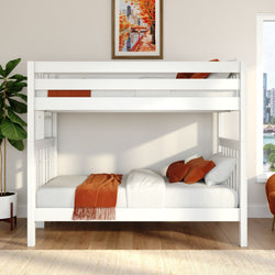 White wooden twin bunk bed with orange throw and pillows in a modern kids' bedroom with hardwood floors, potted plant and framed autumn city print