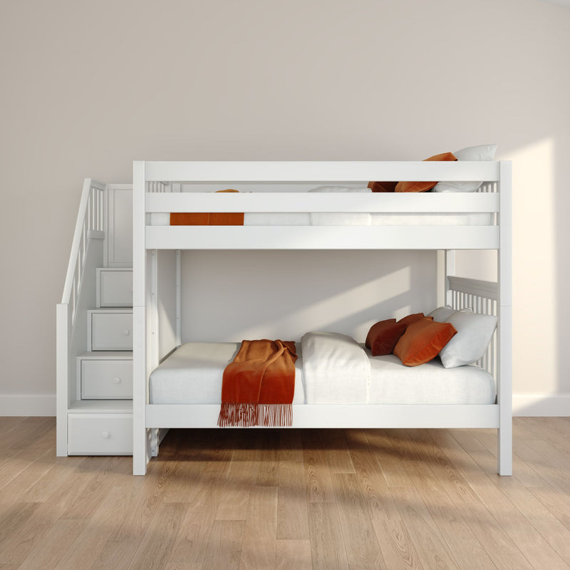 White wooden bunk bed with staircase and built-in drawers, orange pillows and throw in a minimalist kids bedroom with hardwood floor and neutral beige wall, modern space-saving design