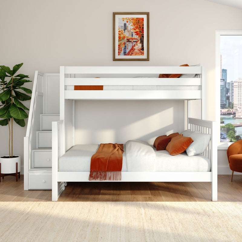 White loft bunk bed with orange accents and pillows, framed autumn cityscape art, potted plant and city view