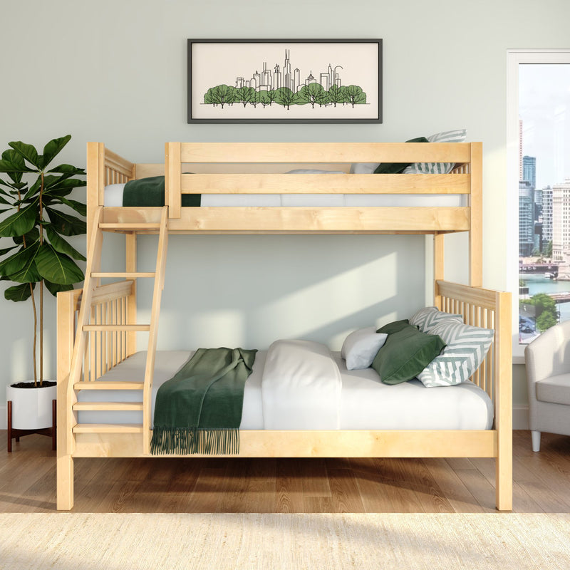 Natural wood bunk bed in modern kids' bedroom with green bedding, leafy potted plant and framed city skyline art