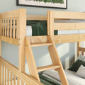 Solid maple wood bunk bed ladder and guardrails with green bedding on a space-saving loft bed for kids' bedroom