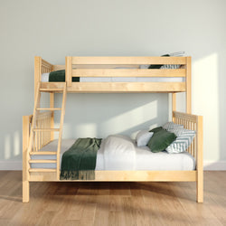 Natural wood bunk bed with ladder and green bedding in a bright minimalist bedroom with hardwood floors