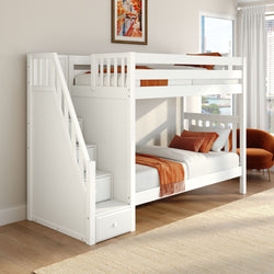 White loft bunk bed with built-in storage stairs and orange bedding in a sunlit modern kids' bedroom with city-view window