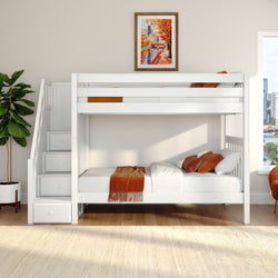 White modern bunk bed with built-in storage stairs and drawers, orange throw blanket and pillows, framed autumn cityscape print, potted fiddle leaf fig and city-view window in a bright neutral kids' bedroom