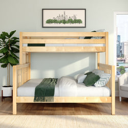 Natural wood bunk bed with green bedding in a modern kids' bedroom, fiddle leaf fig plant, framed city skyline art above bed and city view through window