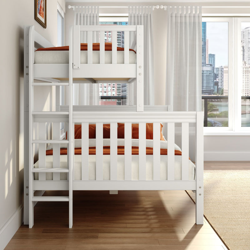 White wooden bunk bed with ladder and rust-orange bedding in a modern kids' bedroom with sheer curtains and city skyline view