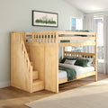 Natural wood bunk bed with staircase storage in a modern kids' bedroom, green bedding, framed skyline art, hardwood floor and city-view window
