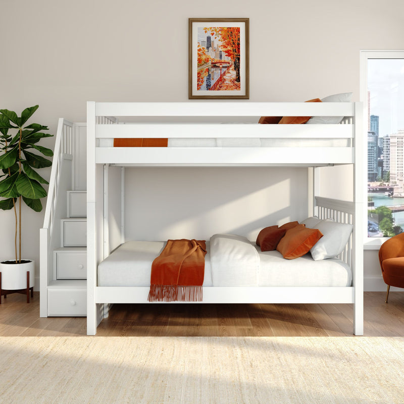 White loft bunk bed with storage stairs and orange bedding in a modern space-saving kids' bedroom, framed autumn cityscape wall art and potted plant