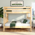 Modern bedroom interior with light wood bunk bed, white linens and green throw blanket and pillows, framed city skyline artwork, potted plant and hardwood floor