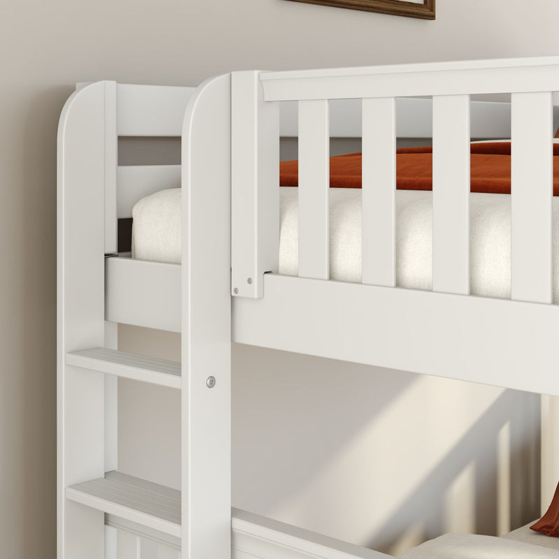 Close-up of white wooden bunk bed ladder and slatted guardrail with beige mattress and rust-orange blanket in a modern children's bedroom