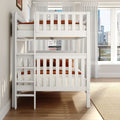 White wooden bunk bed with orange bedding and ladder in a bright modern kids' bedroom with sheer curtains, hardwood floor, and city skyline view
