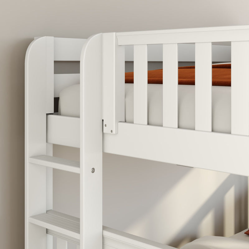 Close-up of a white wooden bunk bed ladder and safety rail with rust-orange blanket, modern kids bedroom furniture detail and slatted bed frame against a beige wall