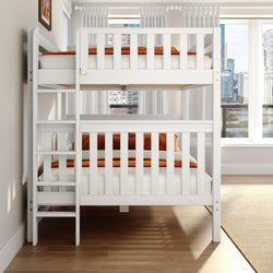 White wooden twin bunk bed with ladder and orange bedding in a bright modern bedroom with hardwood floors and a city skyline view through large windows