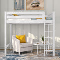 White loft bed with ladder over a cozy reading nook featuring a beige armchair with yellow throw pillow, white round side table with potted plant and book, gray paneled wall and framed city artwork