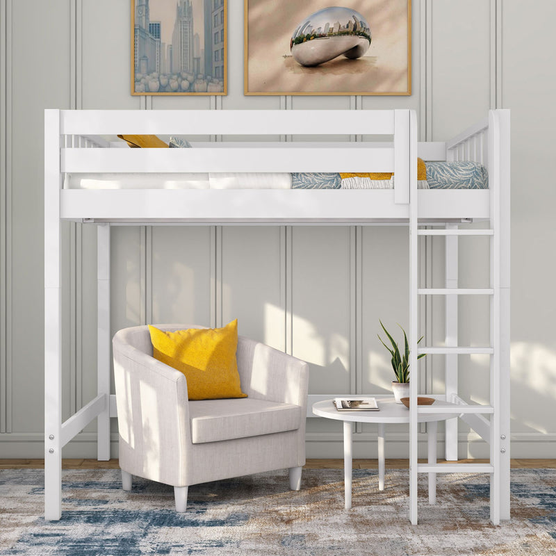 White loft bed with ladder over a cozy reading nook featuring a beige armchair with yellow throw pillow, white round side table with potted plant and book, gray paneled wall and framed city artwork