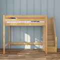 Light wood loft bed with staircase and built-in storage drawers against a blue paneled wall on hardwood floor